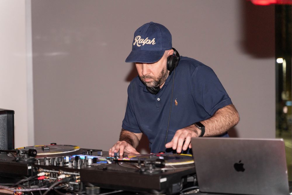 DJ performs at Hats Off