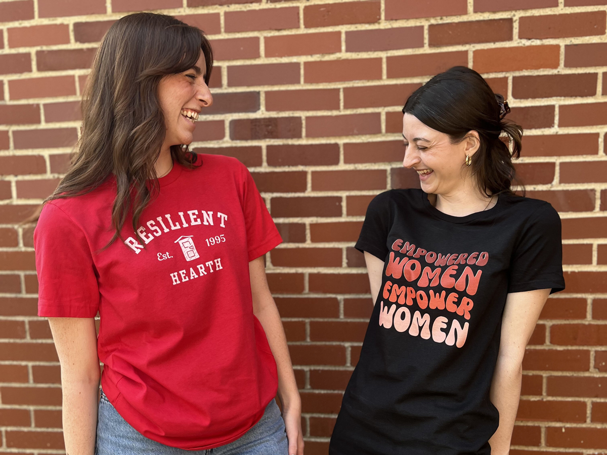 Two HEARTH employees sharing a laugh