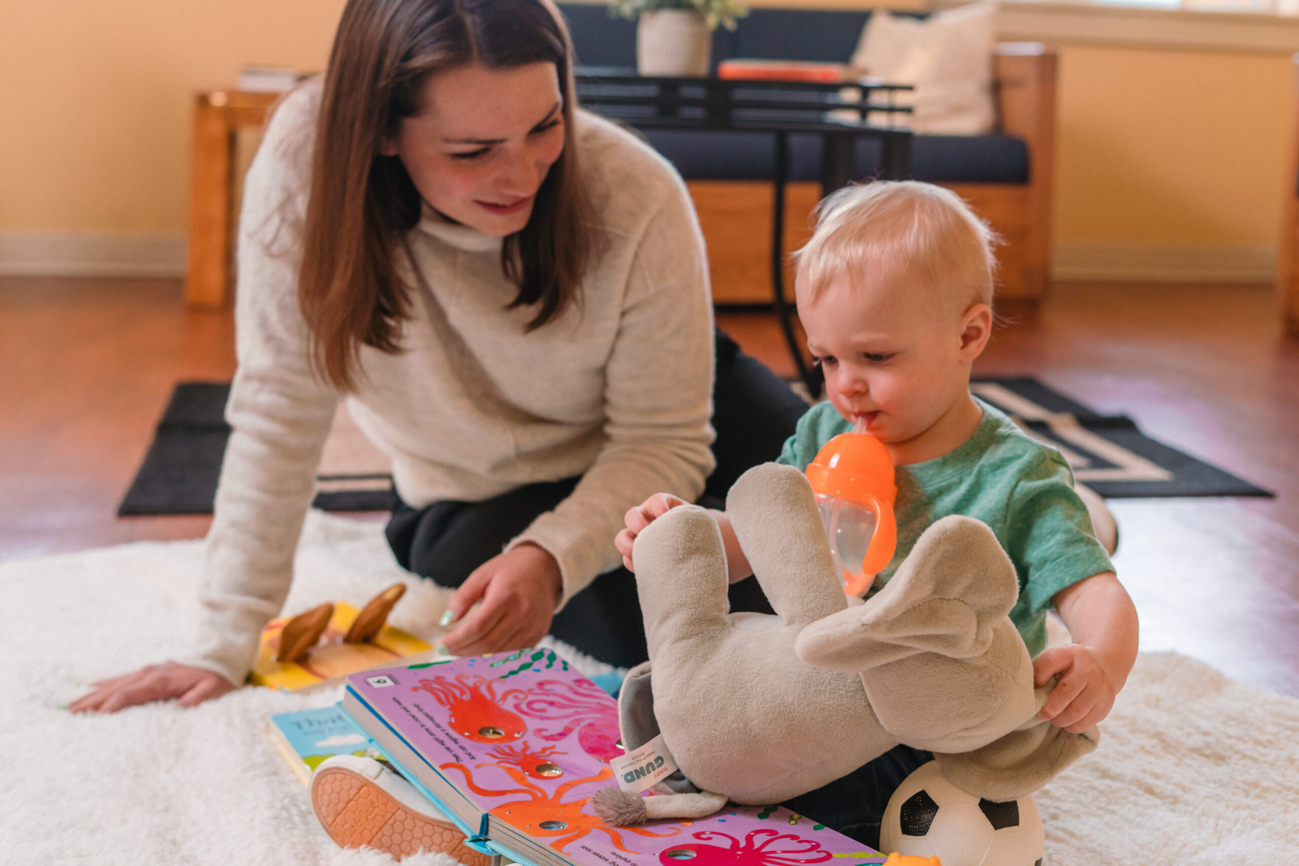 Mother and child playing on the floor
